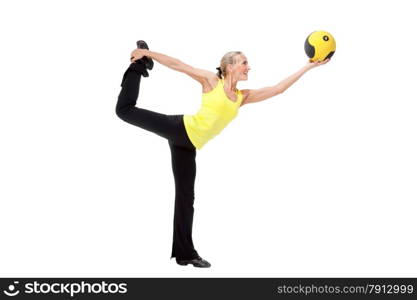 Fitness with med ball: beautiful young woman doing exercises with ball. Yellow and black color