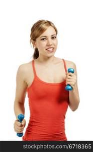 fitness woman exercise with dumbbells. young fitness woman exercising with blue dumbbells on white background