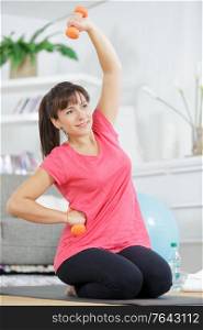 fitness woman exercising doing weights