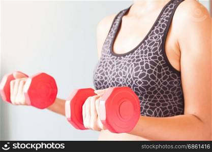 Fitness woman holding red dumbbells, Workout and healthy