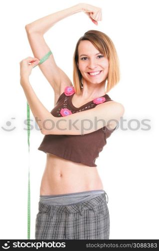 Fitness woman jumping excited isolated on white background image of beautiful multiracial Caucasian female model smiling showing muscles