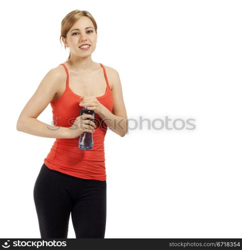 fitness woman opening bottle of water. young beautiful fitness woman opening bottle of water on white background