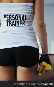 fitness woman personal trainer in sport club indoor