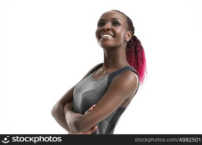 Fitness woman portrait isolated on white background. Smiling happy female fitness model looking happy. Fresh beautiful African fitness girl.