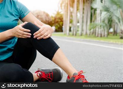 fitness woman runner feel pain on knee. Outdoor exercise activities concept