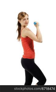 fitness woman train with dumbbell. smiling fitness woman train with blue dumbbell on white background