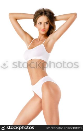 Fitness woman with a beautiful body on white background. Fitness young woman with a beautiful body