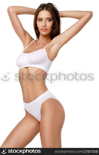 Fitness woman with a beautiful body on white background. Fitness young woman with a beautiful body