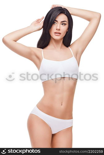 Fitness woman with a beautiful body on white background. Fitness young woman with a beautiful body