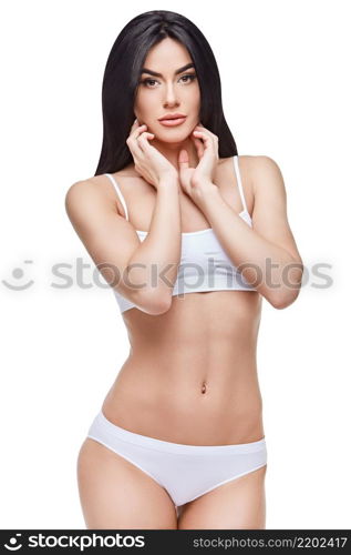 Fitness woman with a beautiful body on white background. Fitness young woman with a beautiful body