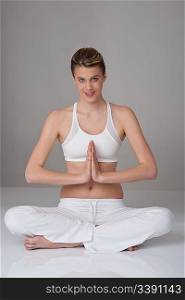 Fitness - Young happy woman in yoga position