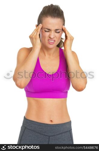 Fitness young woman having headache