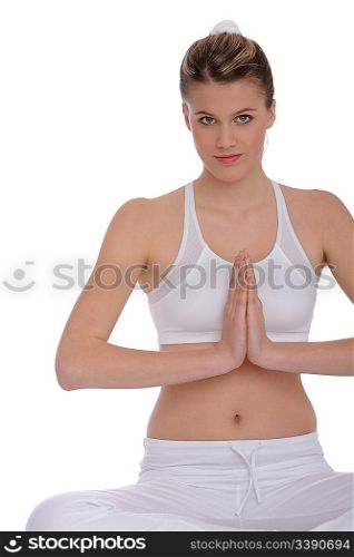 Fitness - Young woman in yoga position on white background relaxing