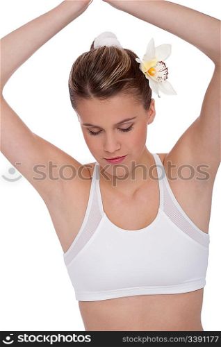 Fitness - Young woman in yoga position on white background relaxing