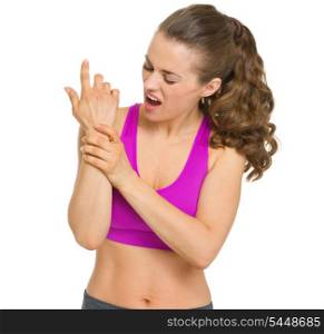 Fitness young woman with wrist pain