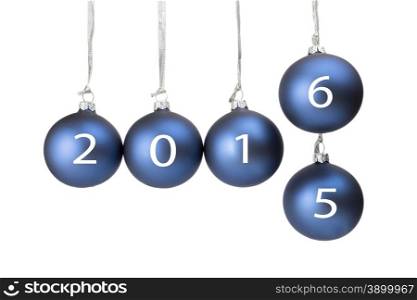 Five blue christmas balls or baubles symbolizing old and new year 2016 isolated on white background