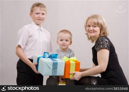 Five children give gifts mother and brother