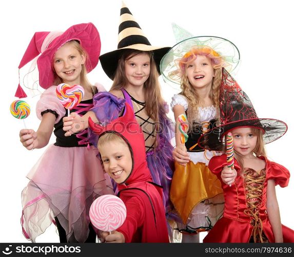 Five Children in Halloween Costumes Witches and Demon Showing their Candies