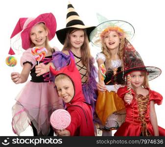 Five Children in Halloween Costumes Witches and Demon Showing their Candies