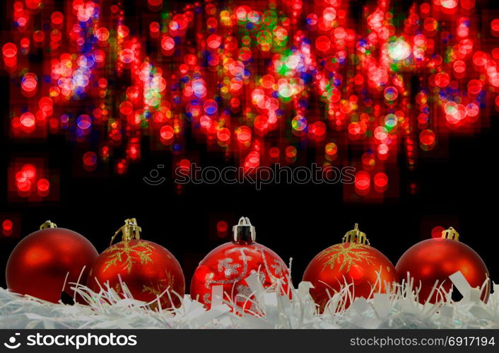 five christmas balls . five christmas balls on a blurred background