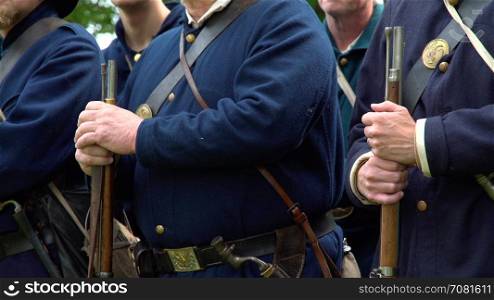 Five Civil War soldiers standing with rifles