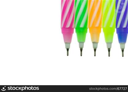 Five color pen on white background with soft light. The spiral pattern on 5 color pen.