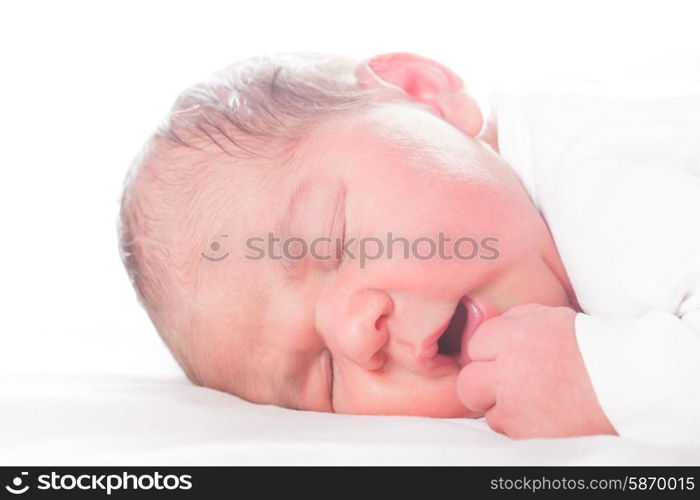 Five days old infant, sleeped on the white