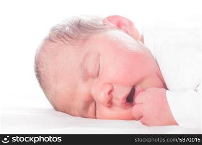 Five days old infant, sleeped on the white