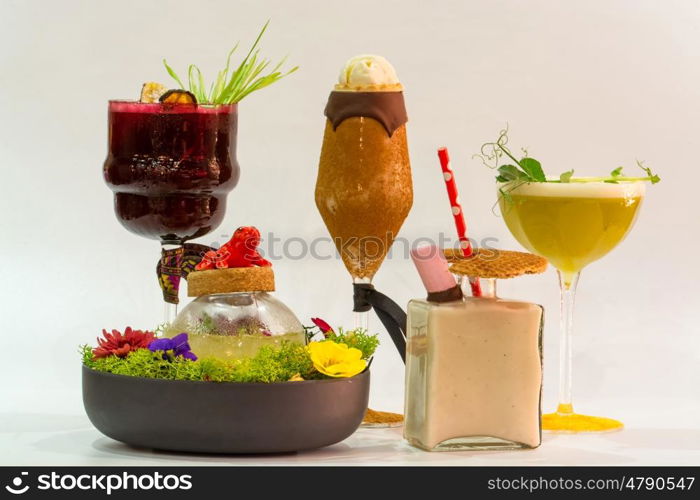 five different colorful alcoholic cocktails