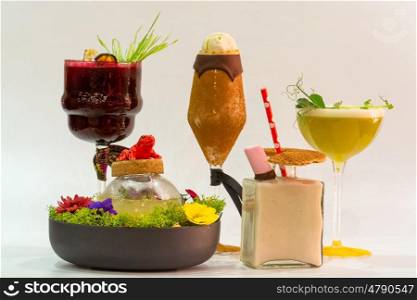 five different colorful alcoholic cocktails