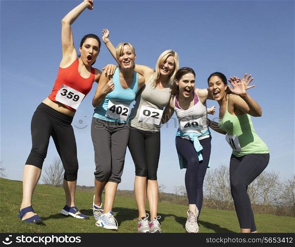 Five Female Runners Training For Race
