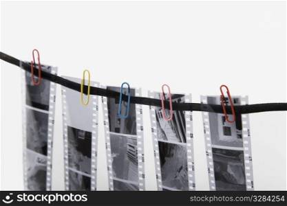 five film strip and colored paper clip