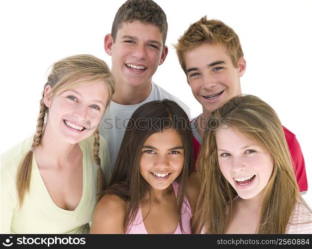 Five friends together smiling
