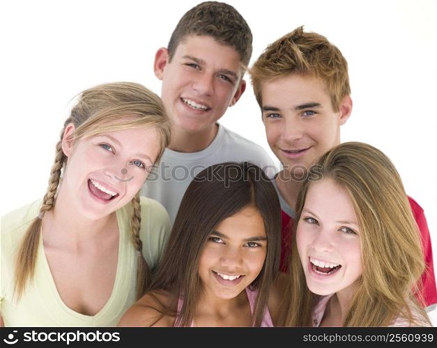 Five friends together smiling