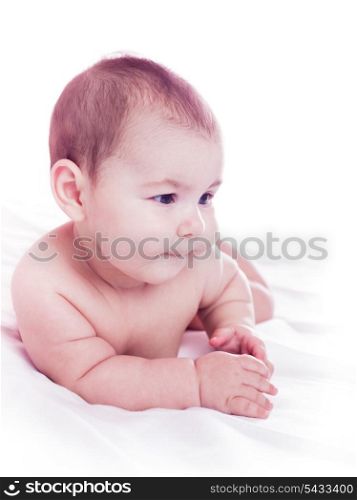 Five month old baby lie and look. Isolated on white