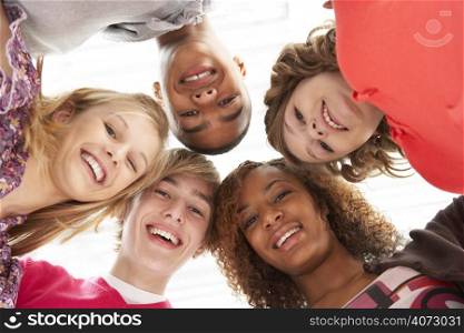 Five Teenage Friends Looking Down Into Camera
