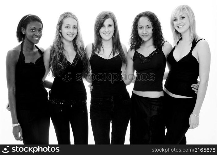 Five teenage girls standing together and smiling