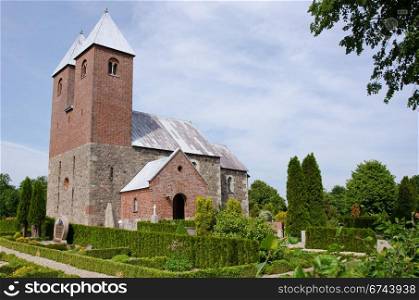 Fjenneslev Church. Outdoor view of Fjenneslev church in Denmark, which is famous for its indoor wall paintings