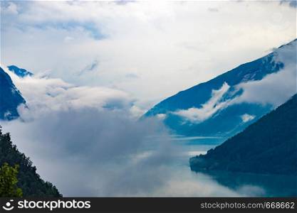 Fjord landscape with clouds over water surface, Norway Scandinavia.. Fjord landscape in Norway