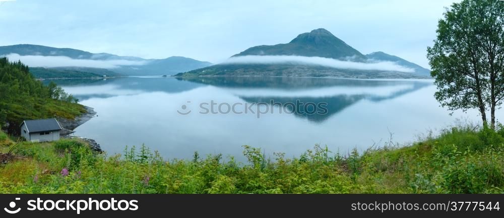 Fjord summer cloudy view with house on shore (Meloy, Norway)