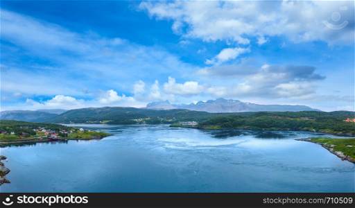 Fjord summer polar day view from bridge with flowing water, Norway