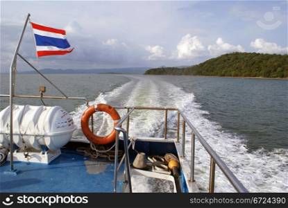 Flag and ferry in Thailand