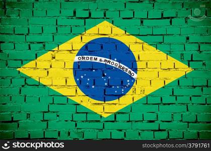 flag from Brazil painted on a stone wall