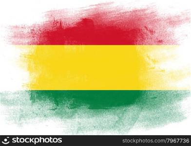 Flag of Bolivia painted with brush on solid background,