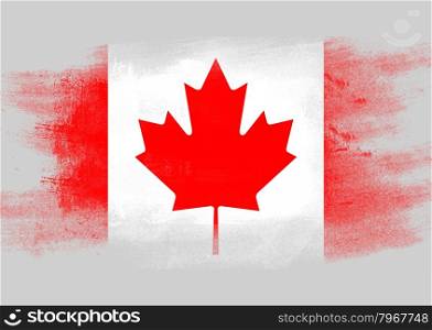 Flag of Canada painted with brush on solid background,