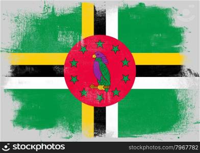 Flag of Dominica painted with brush on solid background,