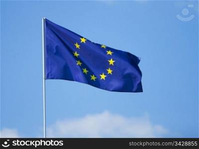 Flag of European Union on the blue sky