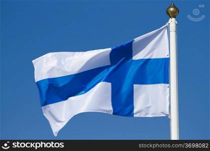 Flag of Finland on a background sky