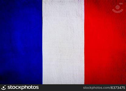 Flag of France, grunge textile background