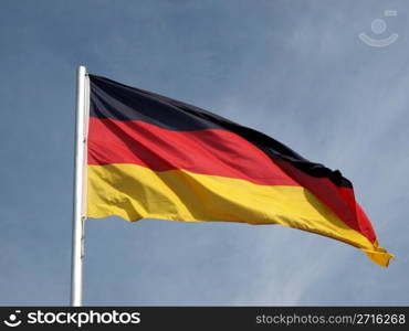 Flag of Germany over a blue sky. Flag of Germany